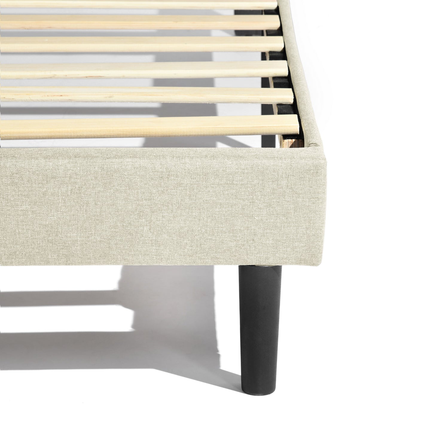 Detail view of the Foothill queen LED platform bed upholstery and frame.